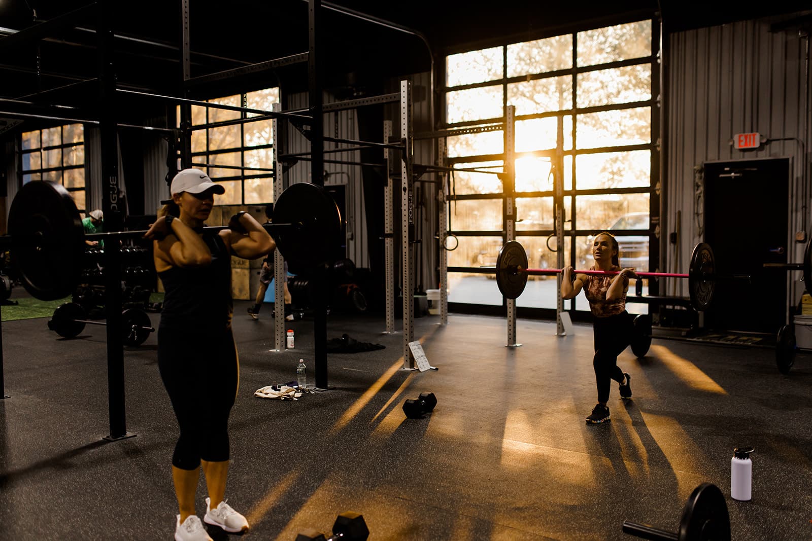 Men rowing at the gym